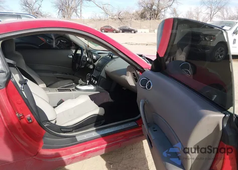 2006 Nissan 350Z Touring z USA, uszkodzony, nr VIN JN1AZ34D26M306792